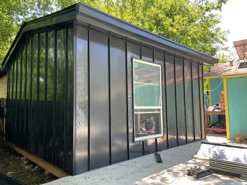 Black standing seam metal wall panels for Roof Inspection in Annapolis Neck